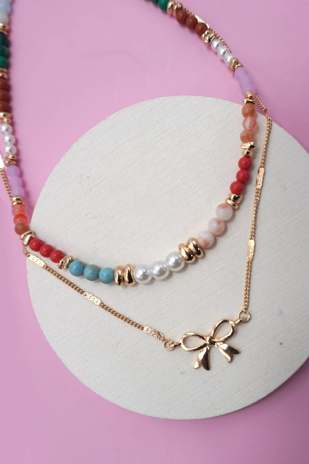 MULTI BEADED BOW CHARM DOUBLE LAYER NECKLACE |
