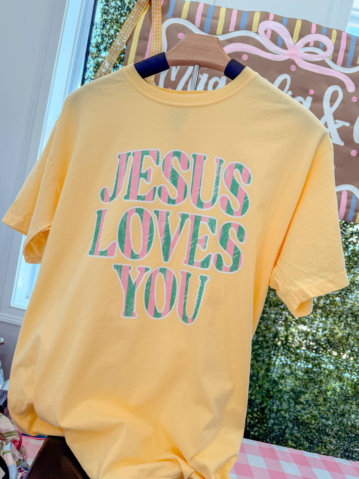 Jesus loves you tee